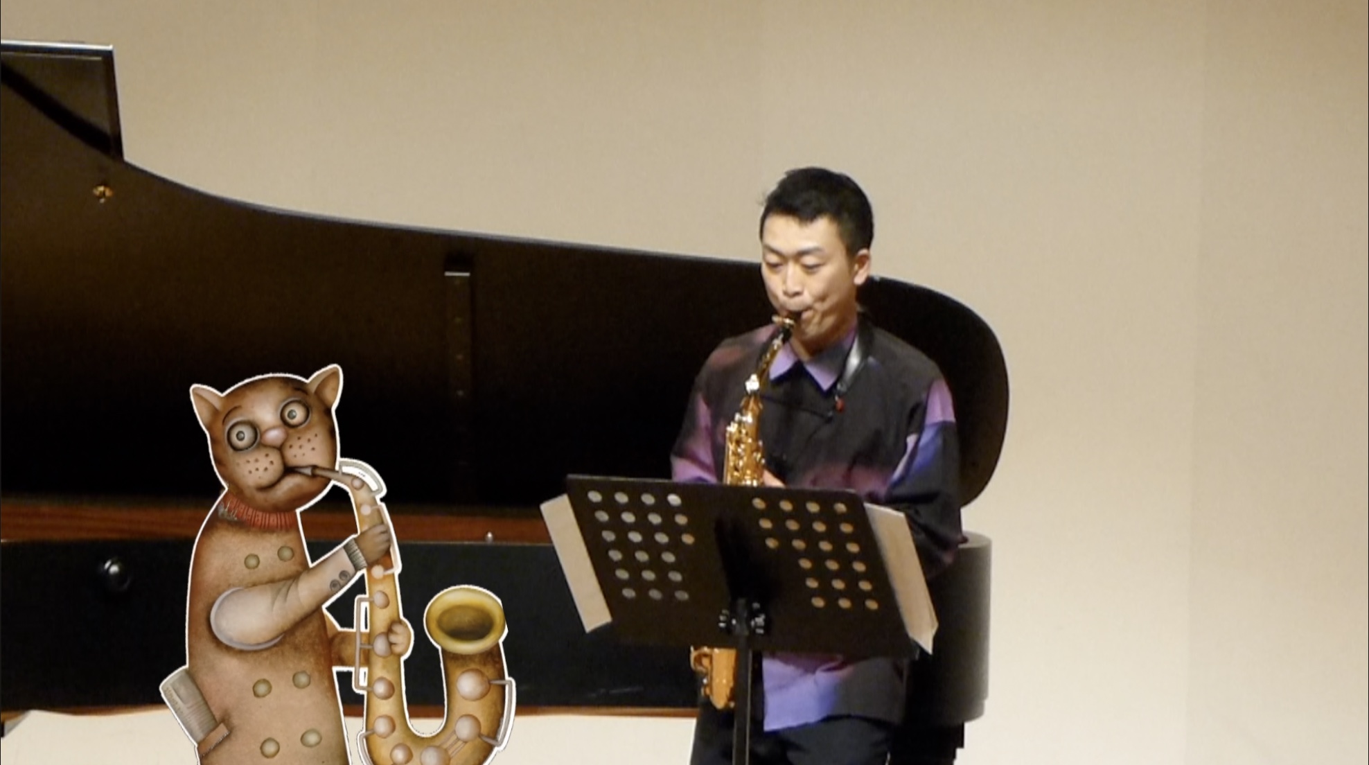 「一時間のクラシック」の会YouTubeより「サキソフォビア Saxophobia」 コミカルな猫のイラストとの演奏カット